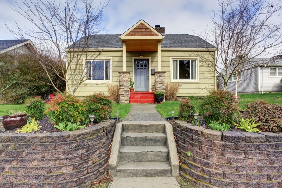 Beige Shingle Small House with Gable Roof