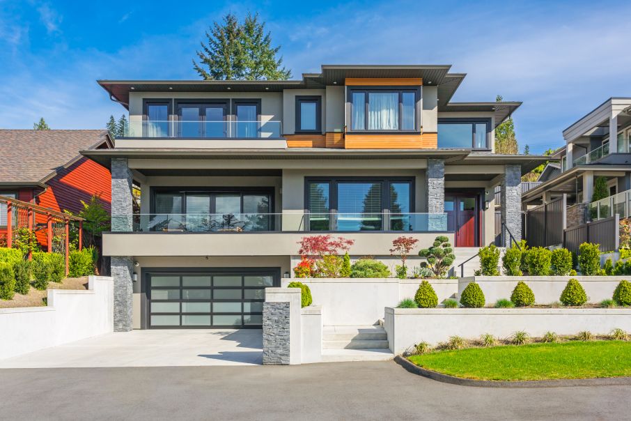 Stucco House with Flat Black Roof Apartments