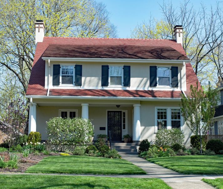 Large Craftsman Gambrel Roof in Vibrant Red Color Palette