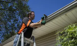 Labor cost to repair gutters